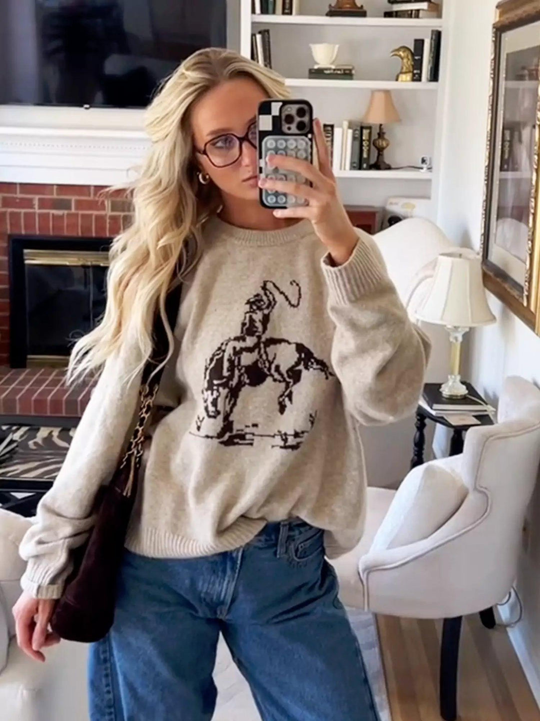 Rundhals sweater med cowboymotiv